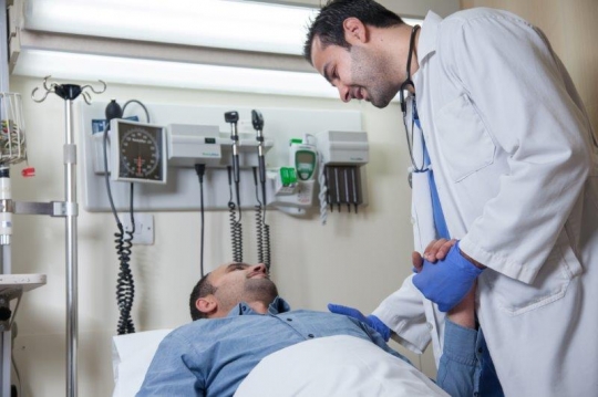Doctor Examining Patient at ER