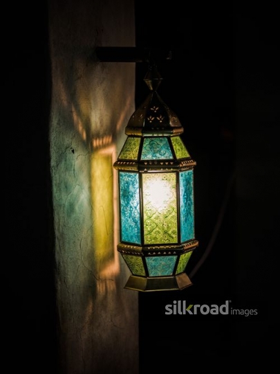Colourful lantern on the wall|-