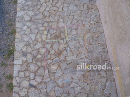 Coloured chalk on the floor|-