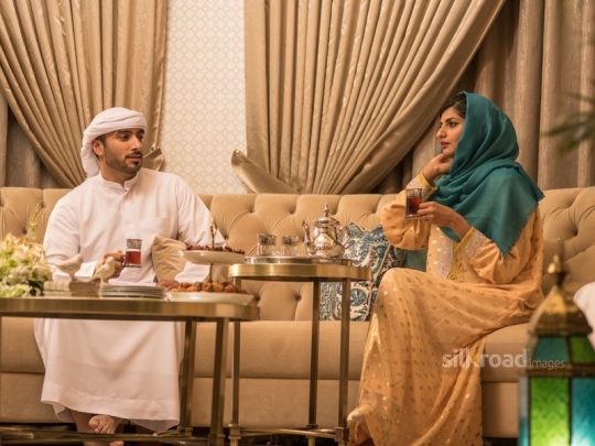 Couple drinking Arabic  tea|-