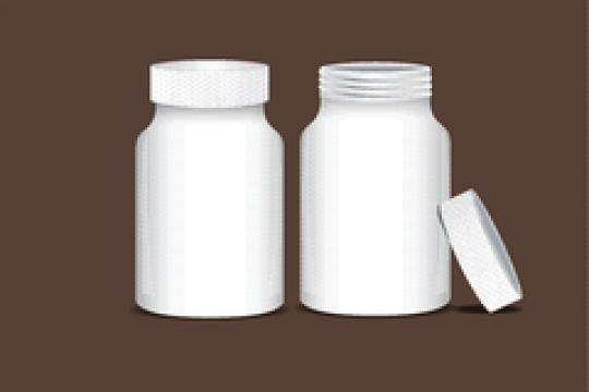 two bottle for tablets on brown background