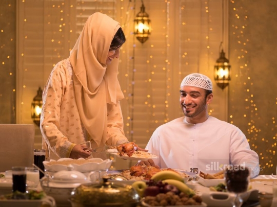 Wife serving meal for husband|-
