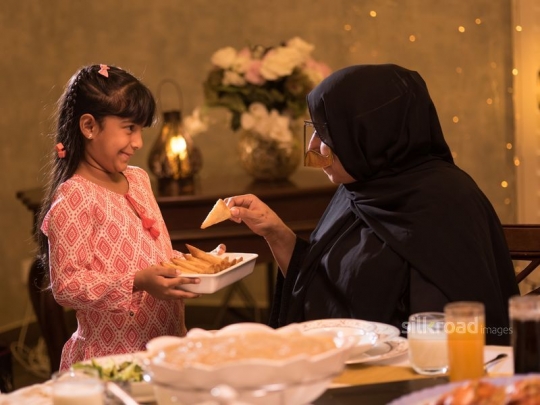 Grand daughter serving puff pastry|-