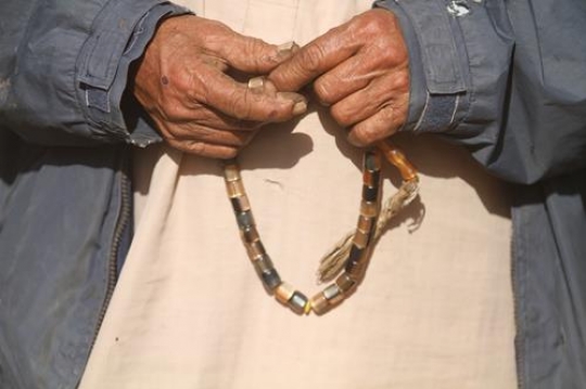 Old palestenian man with Rosary.