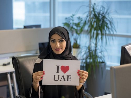 Arab woman proudly celebrating her country|