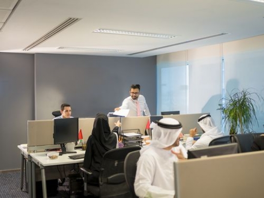 Business people at the office working together|