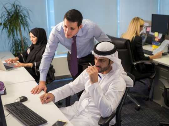 Business people at the workplace communicating with each other|