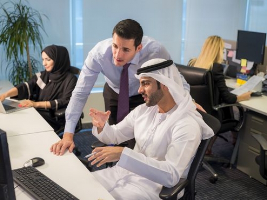 Business people at the office communicating with each other|