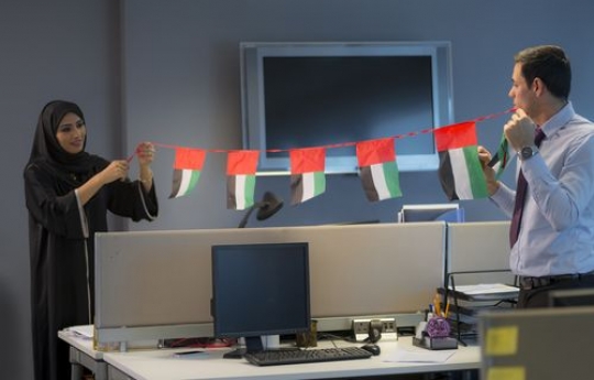 Business man and woman celebrating National Day|