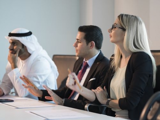 Business people during an office meeting|