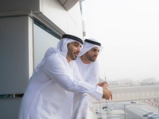 Two businessmen spending time at the balcony|-