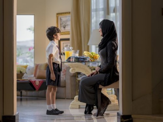 Arab mother and son talking|-