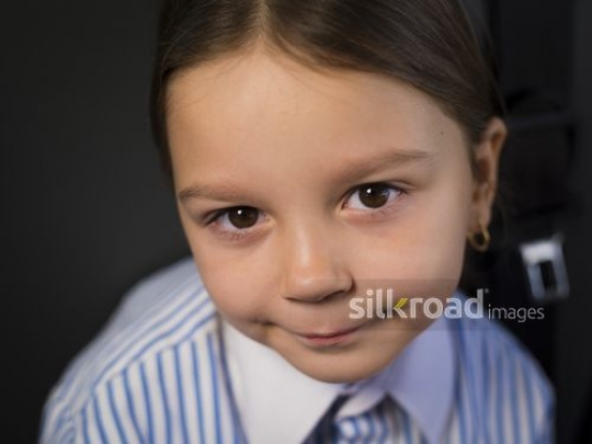 Portrait of a Western Student dressed in a school uniform |-