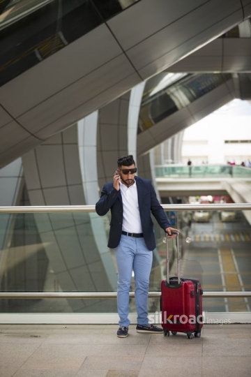 Middle Eastern man at the airport|-