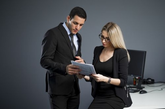 Business people at the workplace talking to each other |