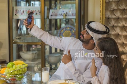 Father taking a selfie with his daughter|