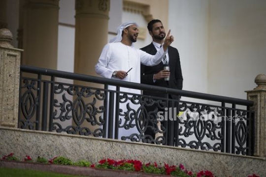 Business man pointing and talking to his employee|-