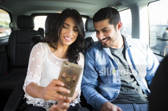 Man and Woman taking a photo together |-