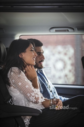 Man and Woman sitting inside the car|-