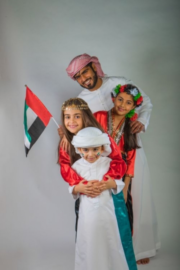 Portrait of a Middle Eastern family representing their country
