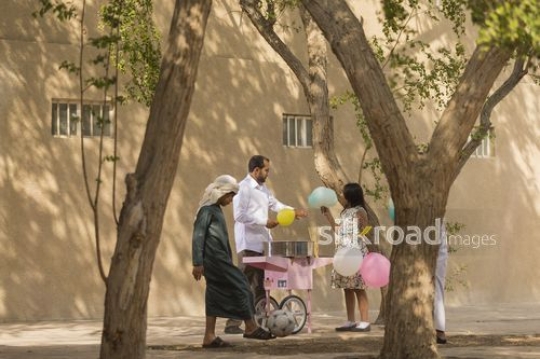 Arab man standing with the young girl|-