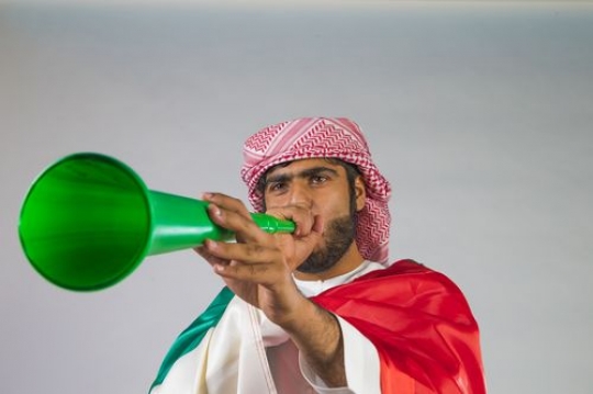 Arab man celebrating the UAE National Day
