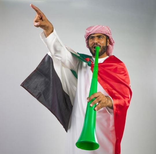 Arab man celebrating 