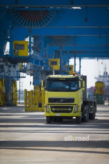 Yellow Transportation Truck Parked|-