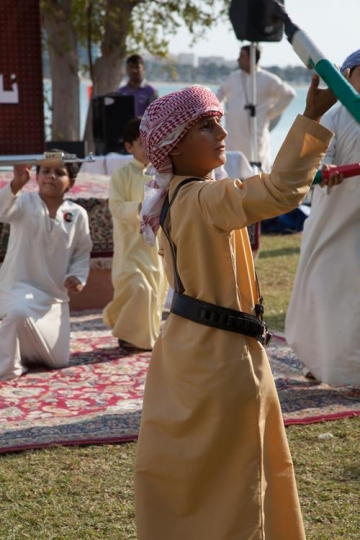 a kid dancing a popular dance