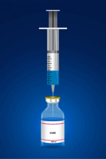 medical ampoule and syringe isolated on blue background