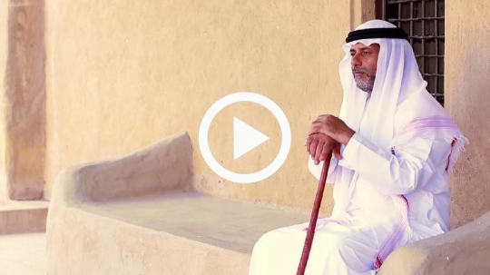 Old man sitting outside