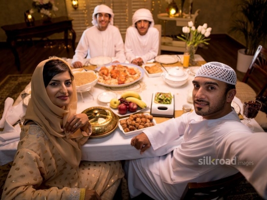 Family taking selfie around iftar|-