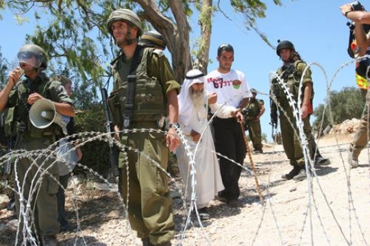 Razor Wire and Soldiers