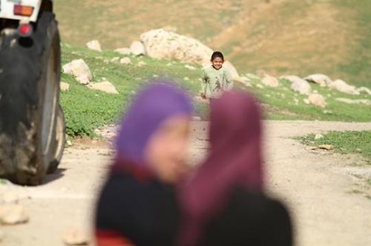 Happy little boy is playing with him brothers.