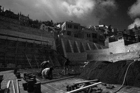 View of the town of Salt in Jordan, Group of construction workers.