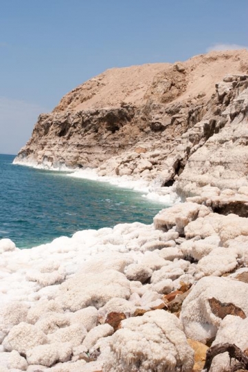 Crystalic salt on a rocks near beach in the Dead Sea, Jordan