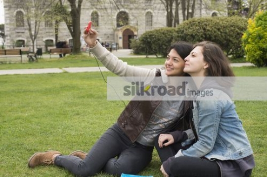 Women taking a selfie together|