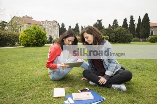 University Friends using the tablet |