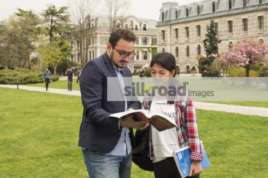 European Student talking to the professor|