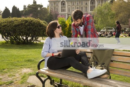 Students talking to each other|