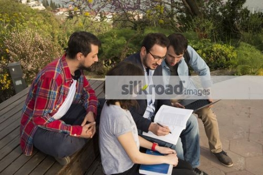 European Students talking to the professor|