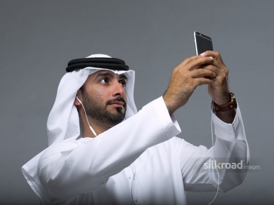 Businessman checking for connection