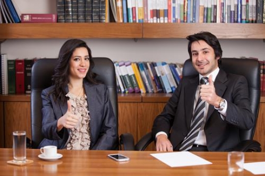 positive couple in the office 