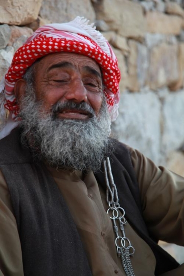 old man smiling to the camera