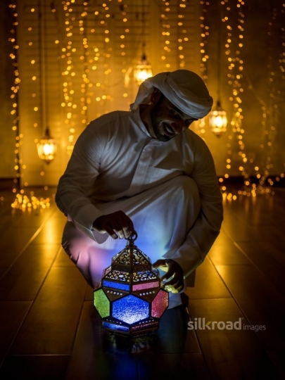 man holding lantern|-