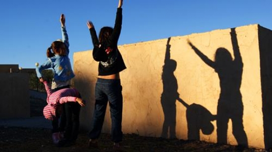happy girls jumping in the air