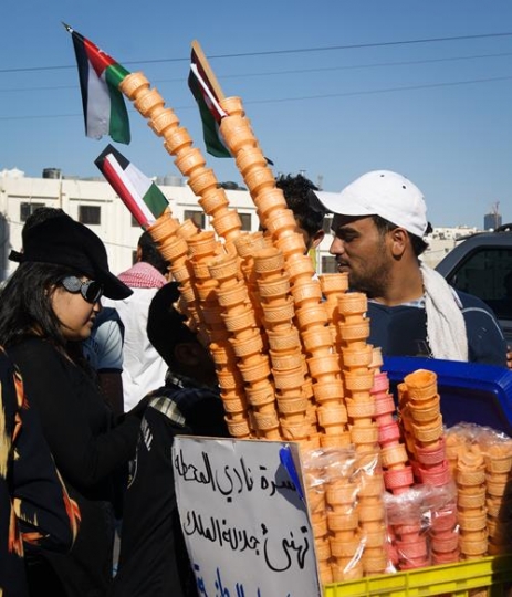 man selling ice cream in the street