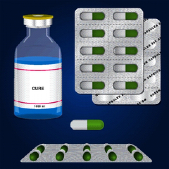 capsules packed in blister and a medical ampoules on blue background