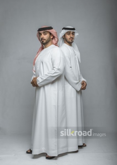 Two Arabian men standing with pride