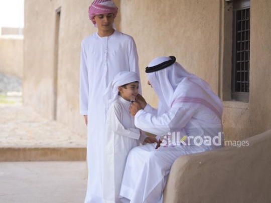 Kids greeting grandfather|-